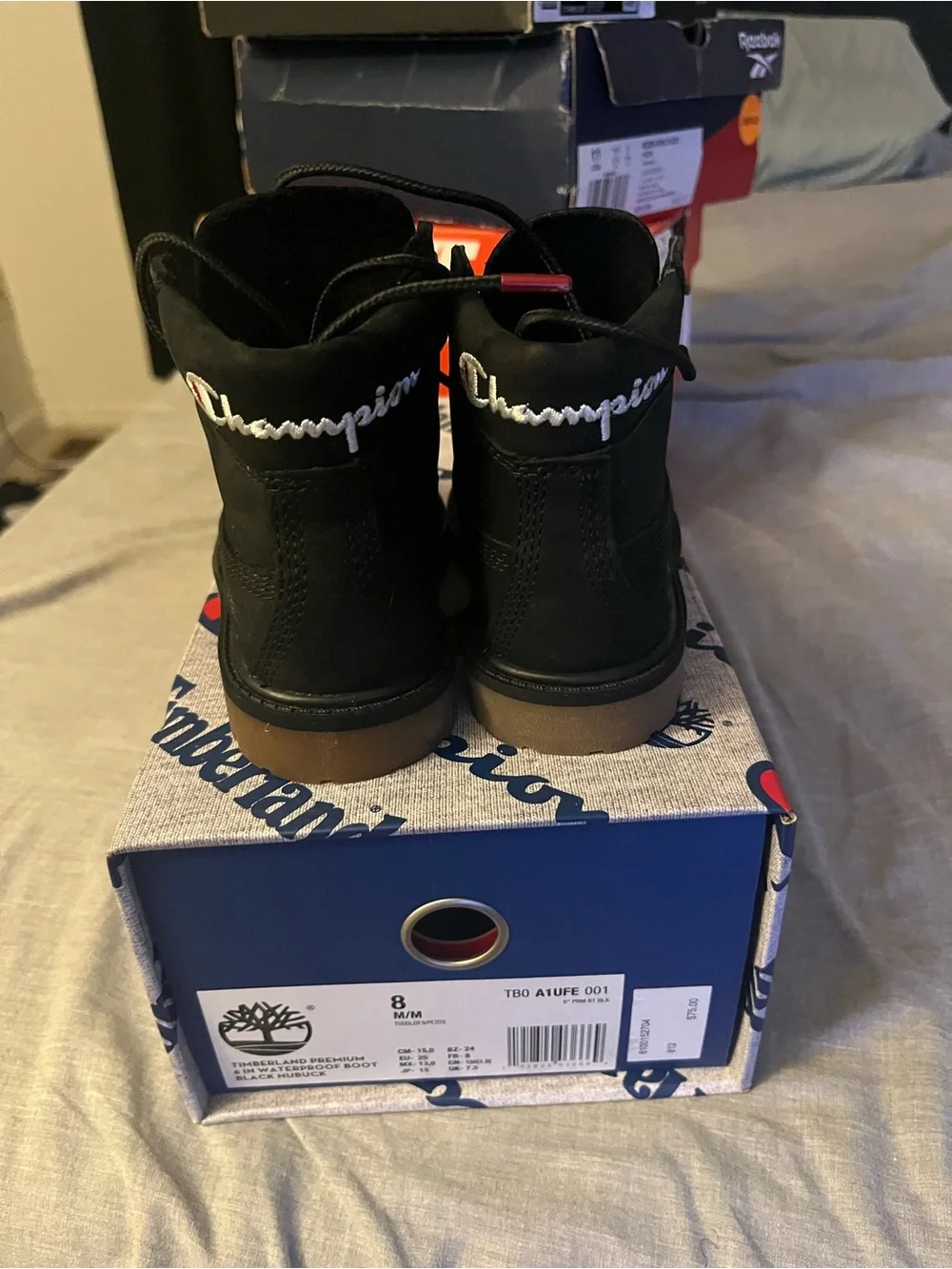 Timberland Kids Black Lace-Up Boots with Brown Outsole and Red Eyelets